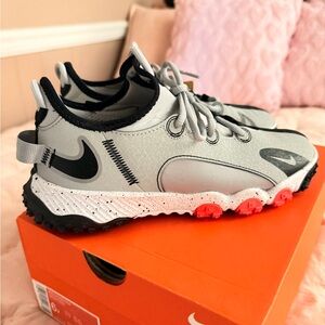 Nike Grey and Black Trail Sneakers with Coral Accents